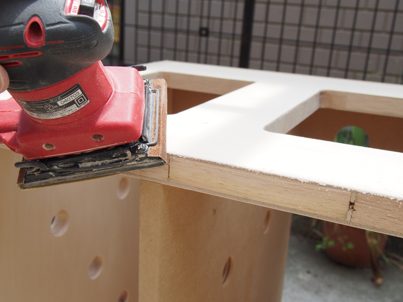 1. Sanding with the power sander