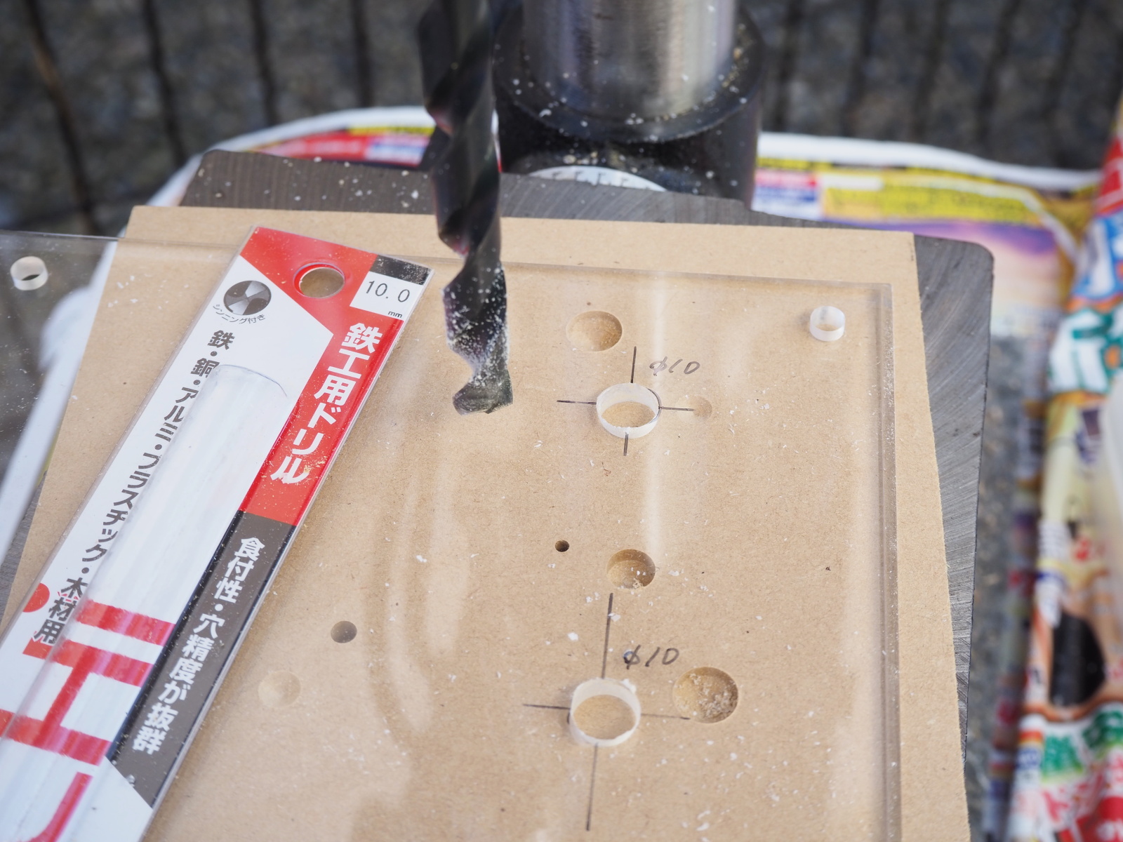 Boring holes in aclyric panel