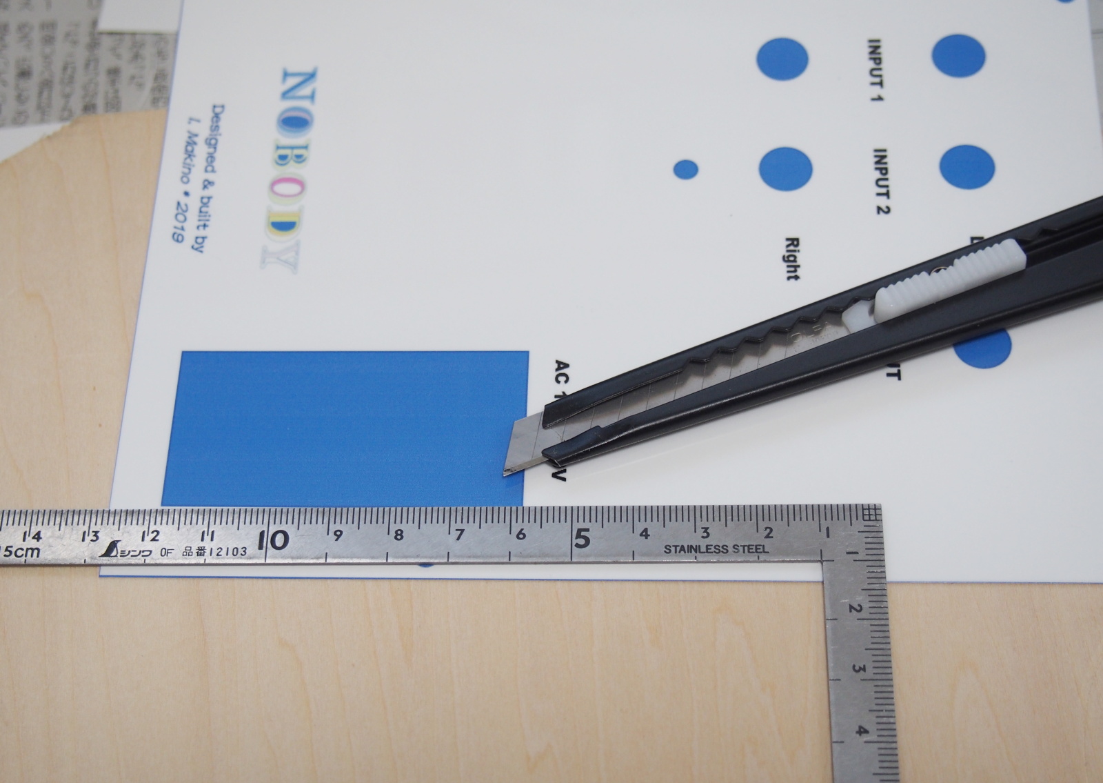 Cut out holes in the sticker