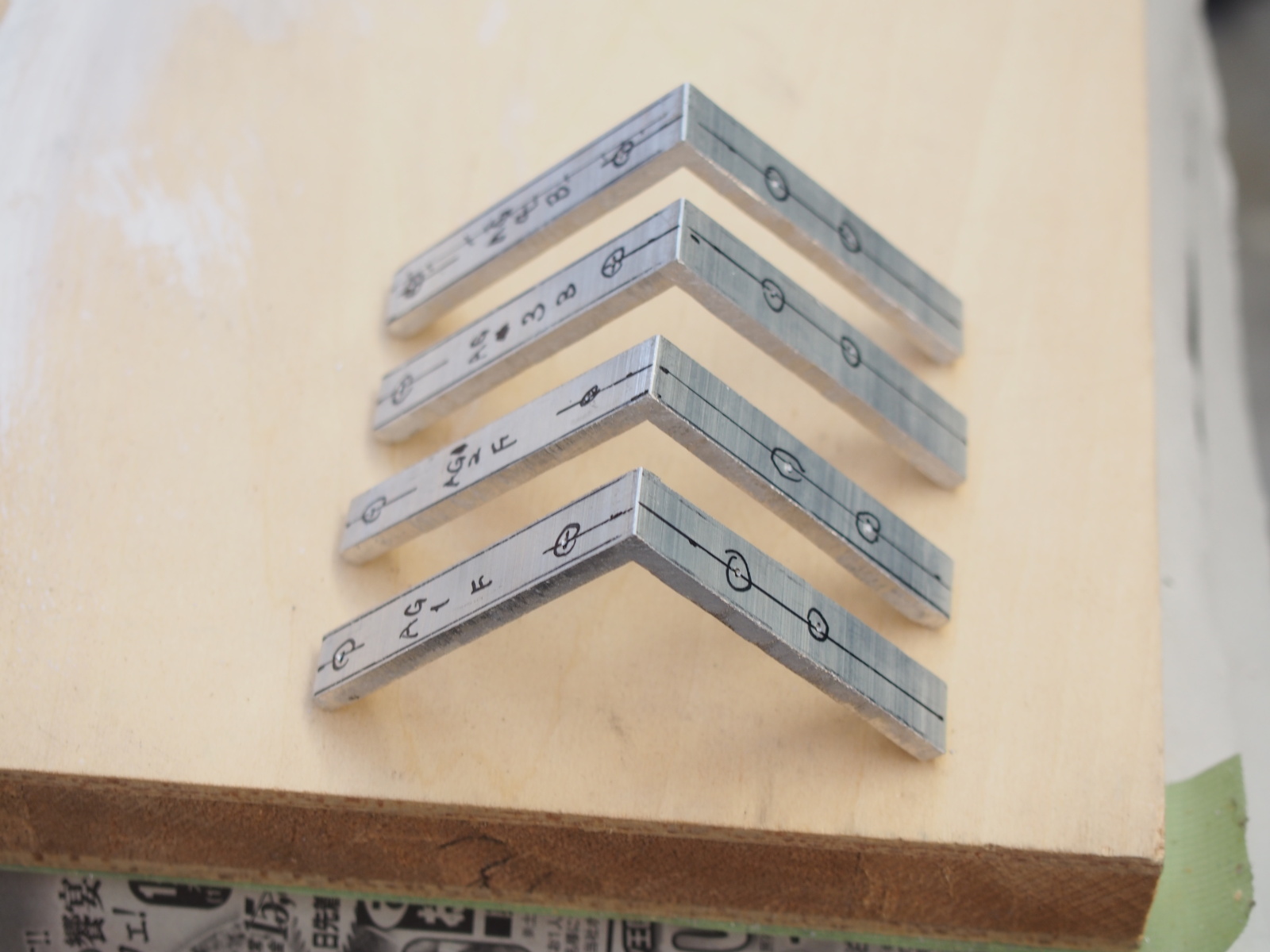 Small L-angles cut out of long L-angle