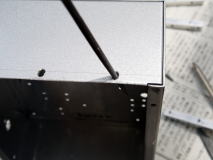 Adjusting screw holes