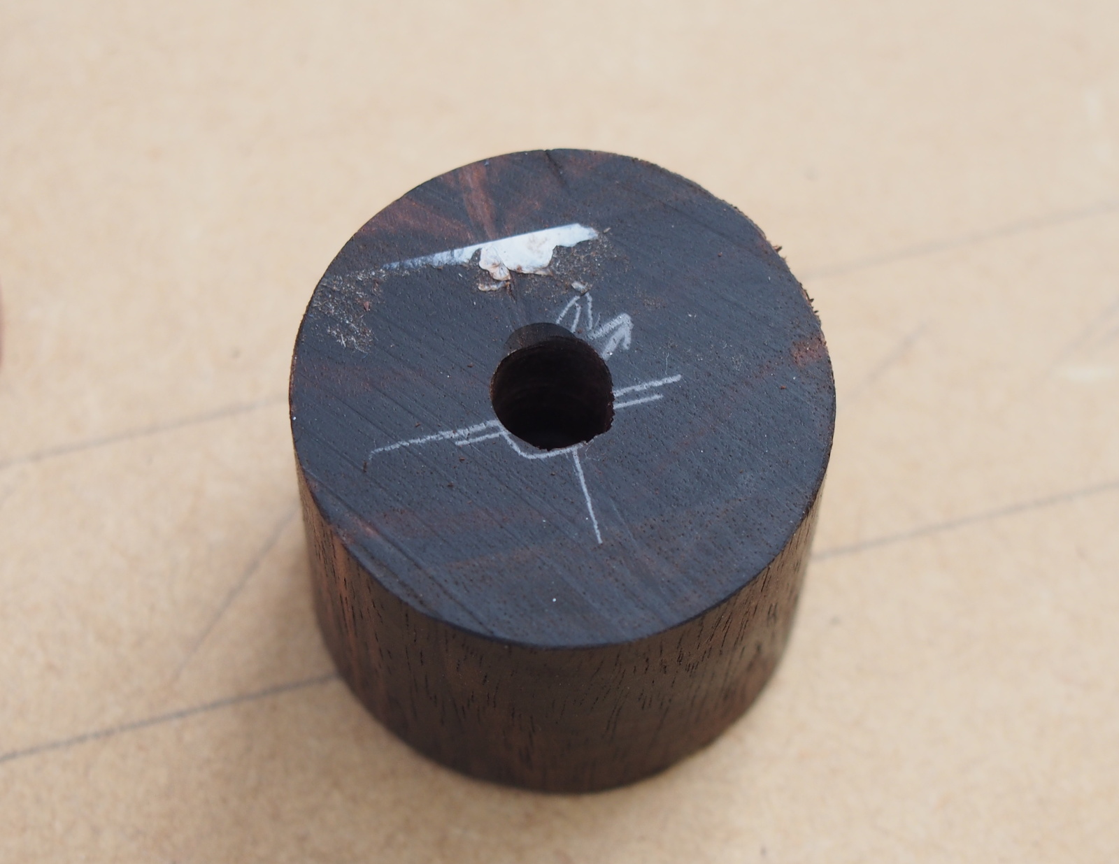 Knob with slightly off-centered hole